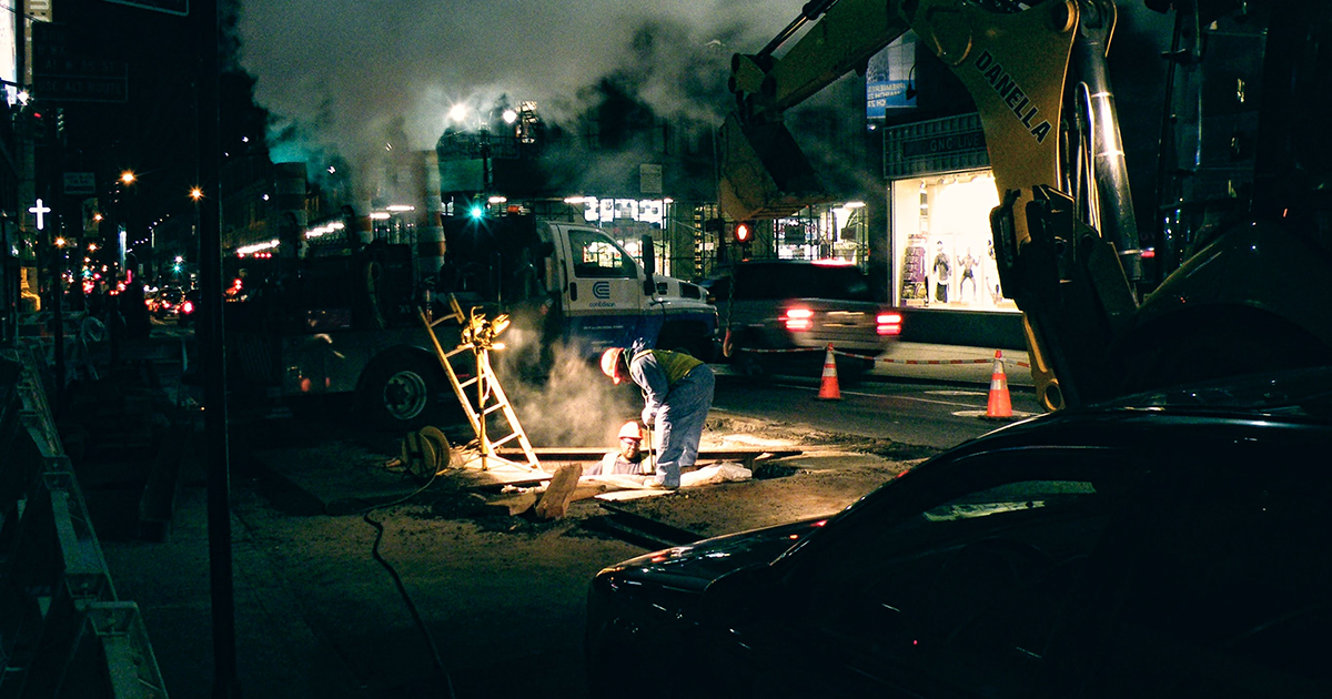 road workers at night
